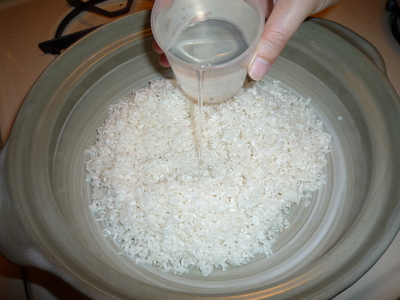 Stove top rice-add water and rice to pot