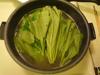 Fuki leaves into the pot